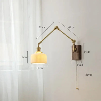 Brass-finished adjustable wall lamp with ribbed cream glass shade and dark wood backplate for bedroom decorbites copper wall