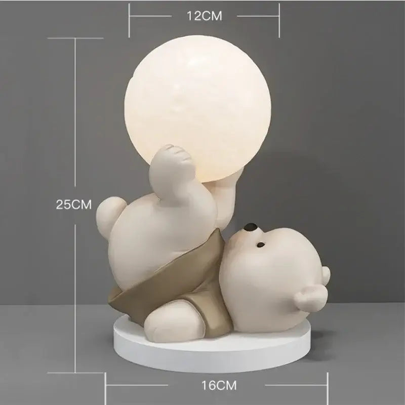 Nordic cream ceramic bear table lamp features a cute white resin bear holding a glowing lamp with beige shorts