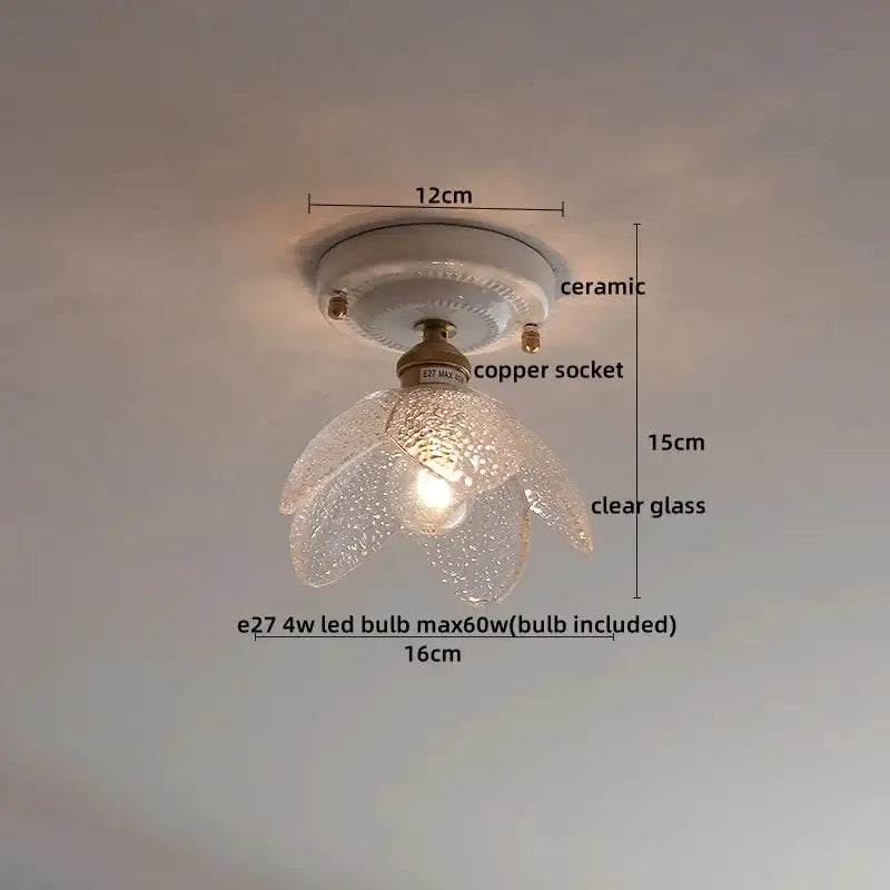 Nordic cream ceramic led ceiling light with clear textured glass petals copper socket and a flower-shaped design