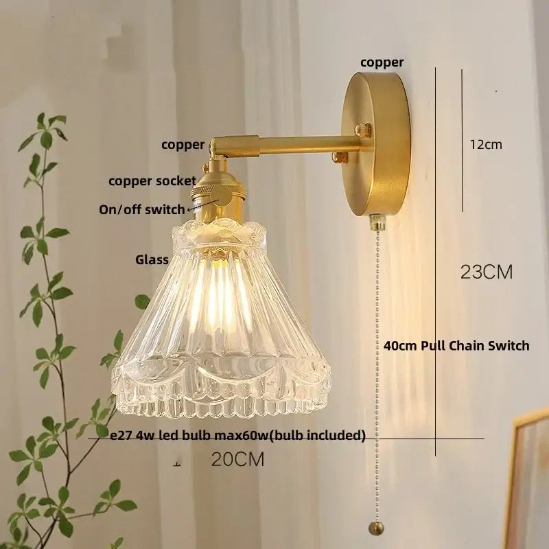 Vintage-style nordic gold brass led wall sconce with adjustable arm and ornate faceted clear glass shade decorbites brass led