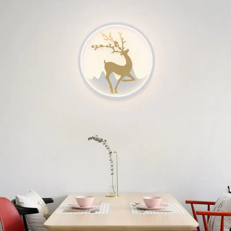 Nordic gold deer circle wall lamp with golden deer silhouette on softly glowing white background led fixture included