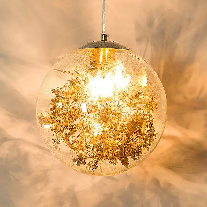 Nordic gold floral glass led pendant lamp with warm glow and intricate insect designs ideal for kitchen lighting