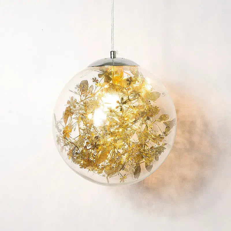 Nordic gold floral glass led pendant lamp with chrome fixture and glowing metallic leaf embellishments for kitchen