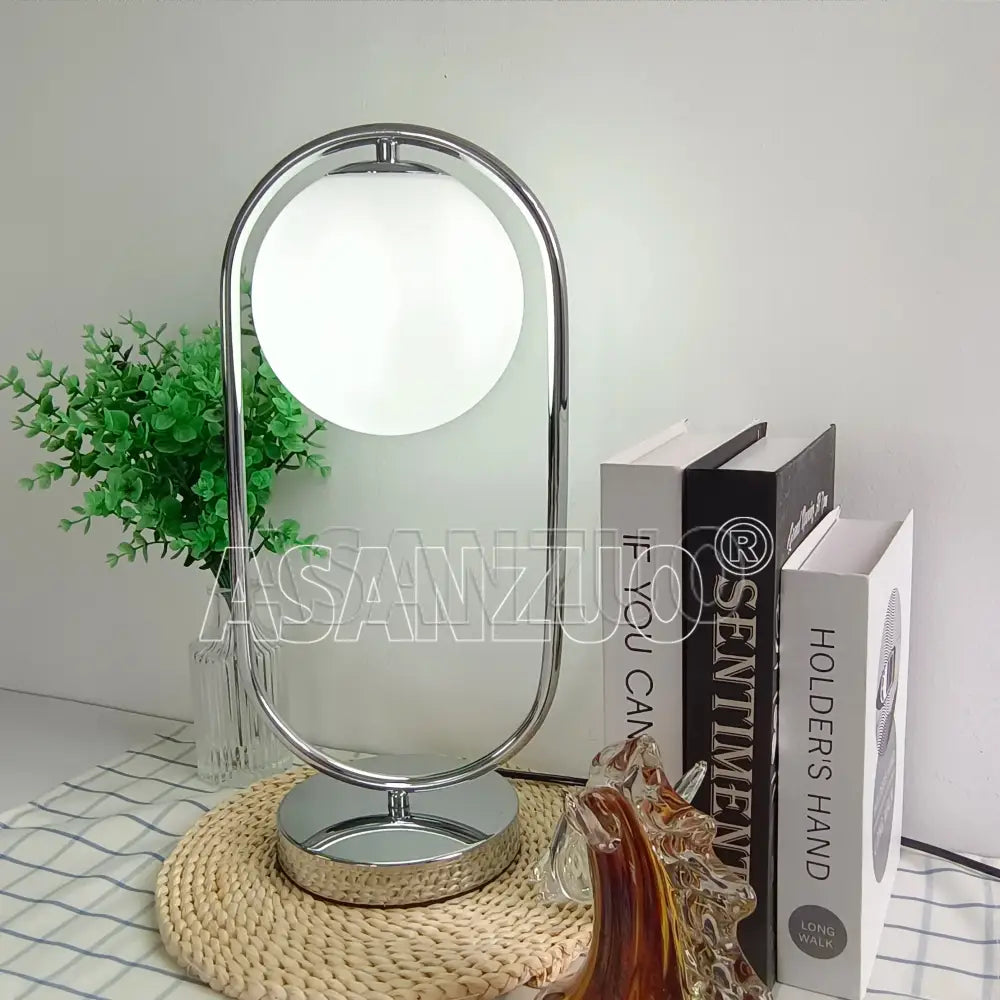 Nordic gold oval glass ball led desk lamp with chrome finish and white glowing spherical glass ball for bedroom decorbites glass ball