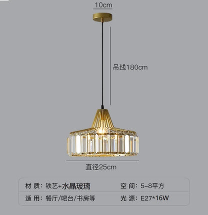 Gold-toned nordic LED crystal pendant lamp with modern geometric design and vertical glass prisms for kitchen island