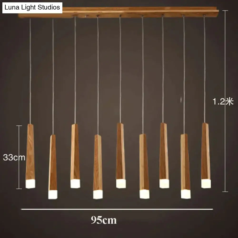 Nordic minimalist wood pendant lamp with nine tapered warm-toned wood shades for dining room lighting