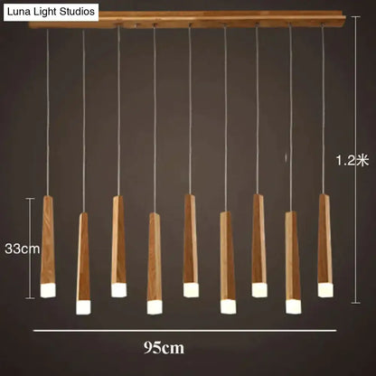 Nordic minimalist wood pendant lamp with nine tapered warm-toned wood shades for dining room lighting