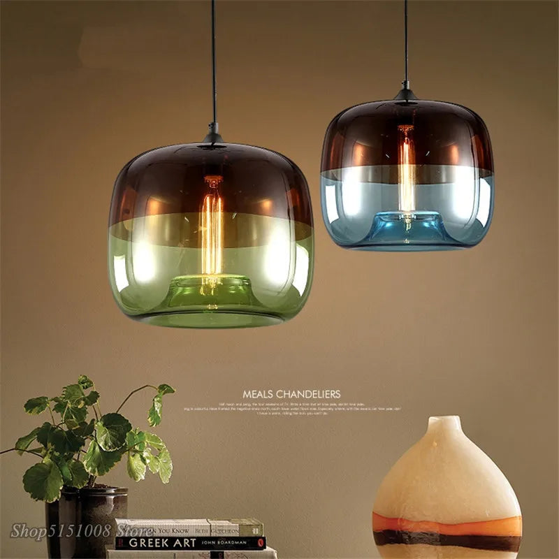 Two nordic modern apple pendant lights with gradient modern apple glass in dark amber green and blue clear tones for home decor