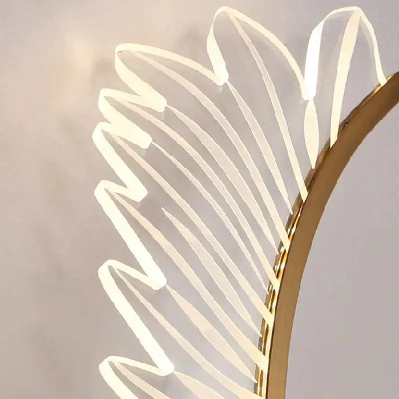 Modern art bedside wall lamp featuring a gold frame and translucent illuminated leaf panels in nordic modern art style