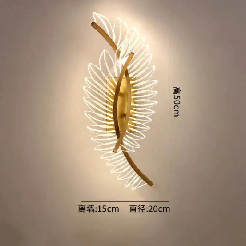 Gold-toned leaf-shaped nordic modern art wall lamp with illuminated translucent petal details for bedroom sconce