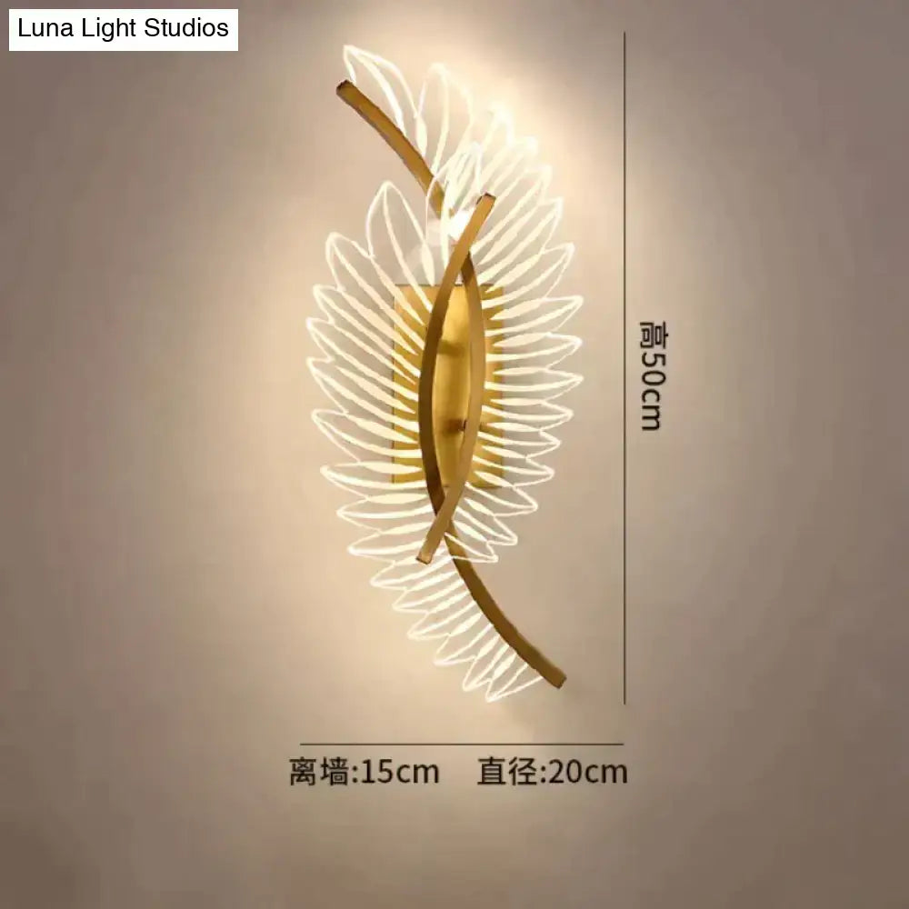 Gold-toned nordic modern art wall lamp with translucent petal-shaped feather design for modern art bedside use