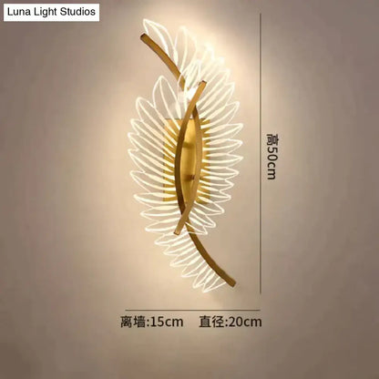Gold-toned nordic modern art wall lamp with translucent petal-shaped feather design for modern art bedside use