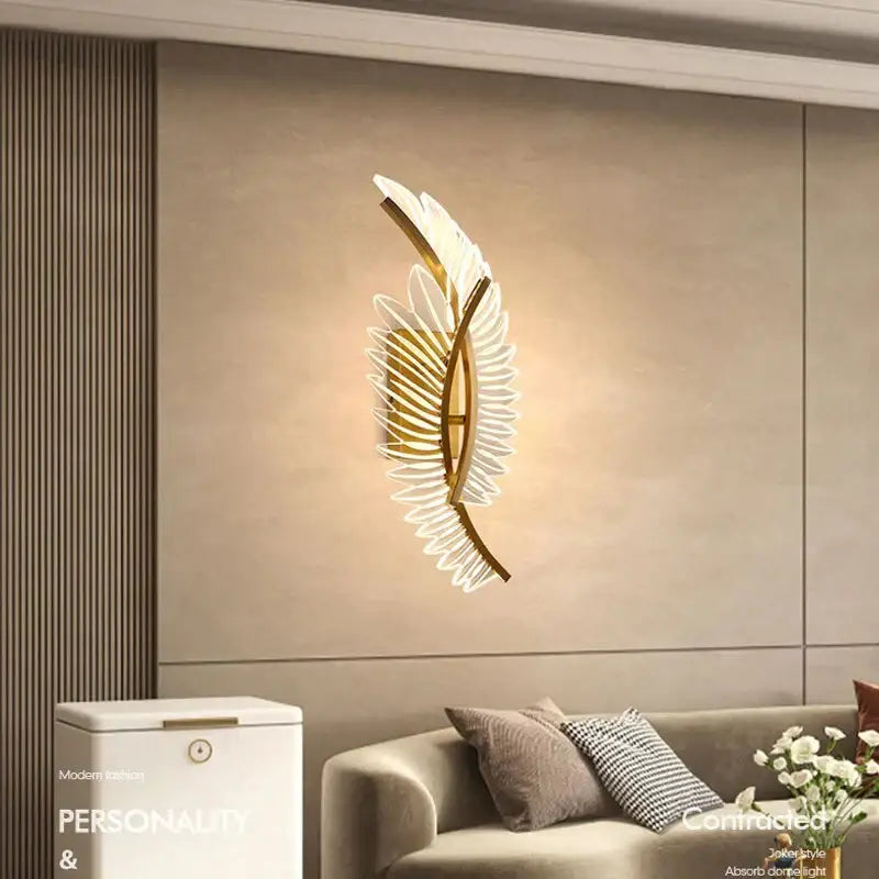 Gold-toned feather wall lamp with translucent white glass accents nordic modern art bedside sconce for bedroom