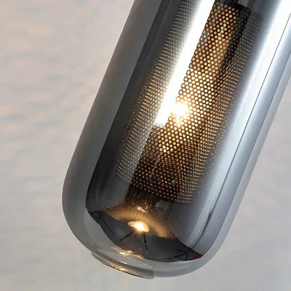 A nordic modern decor brass and glass lampshade pendant light with metallic silver finish and honeycomb mesh diffuser