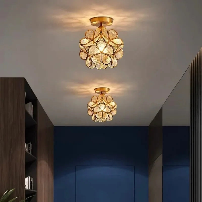 Gold-toned nordic modern petal acrylic pendant lamp with textured translucent glass panels for bedroom and restaurant lighting
