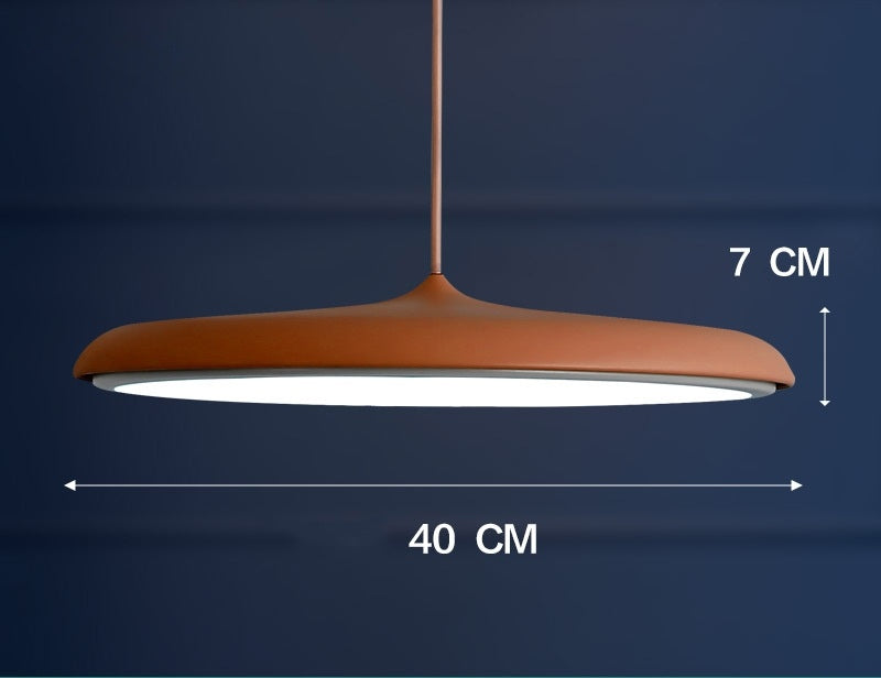 Copper-colored pendant light with matte finish and modern design featuring three color temperature for restaurant use