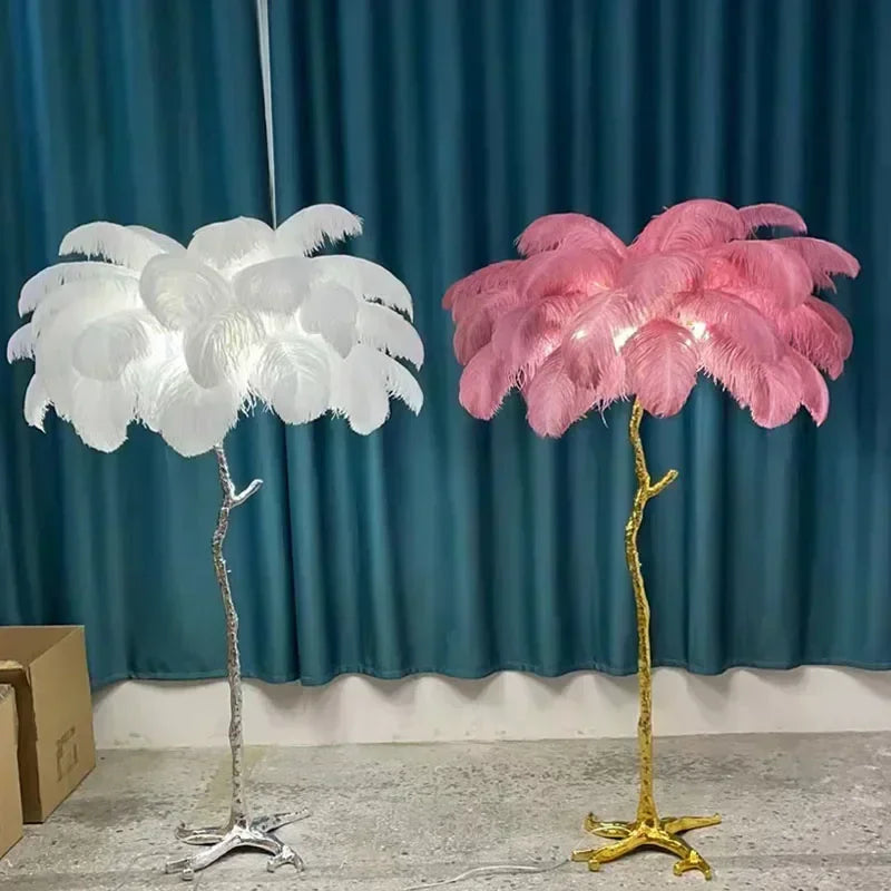 Elegant feather floor lamp with white and pink ostrich feathers on gold and silver tree-like bases for living room decor