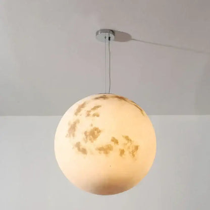 Nordic retro ball moon chandelier pendant light with detailed craters and warm off-white glowing surface for dining room