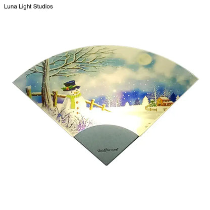 Nordic snowman led fan shaped wall light with painted winter scene for bedroom decor featuring snowman and moonlit sky