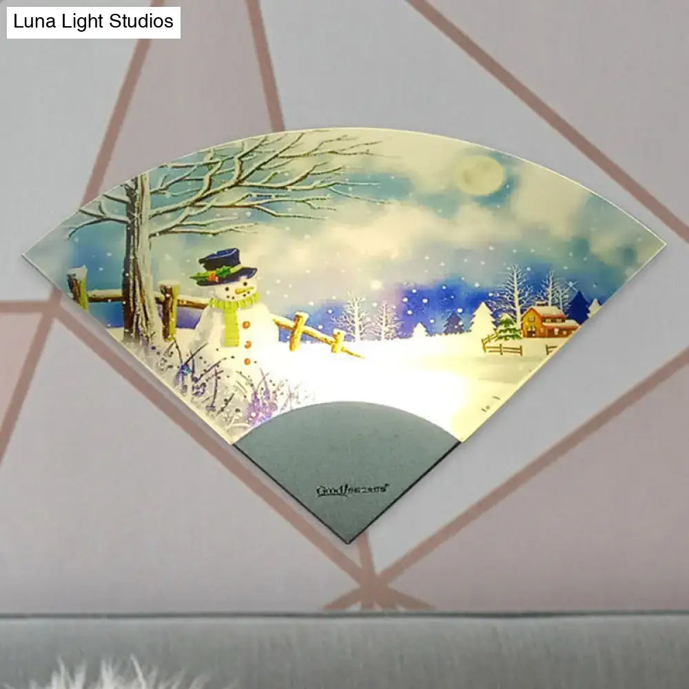 Nordic snowman led fan shaped wall light featuring a blue top hat snowman in a snowy winter scene for bedroom decor