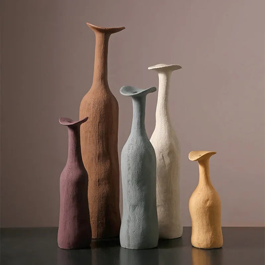 Set of five handcrafted ceramic vases in morandi earthy tones with sculpted necks for nordic modern home decoration