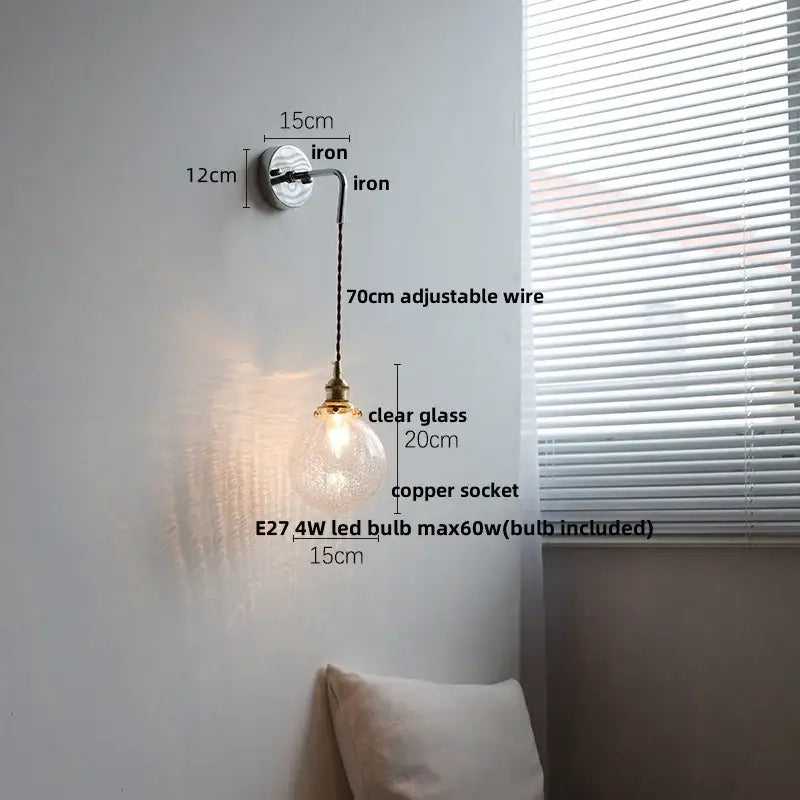 Clear glass globe ceramic led wall light with copper socket and adjustable iron arm for bedroom decorbites ceramic led wall