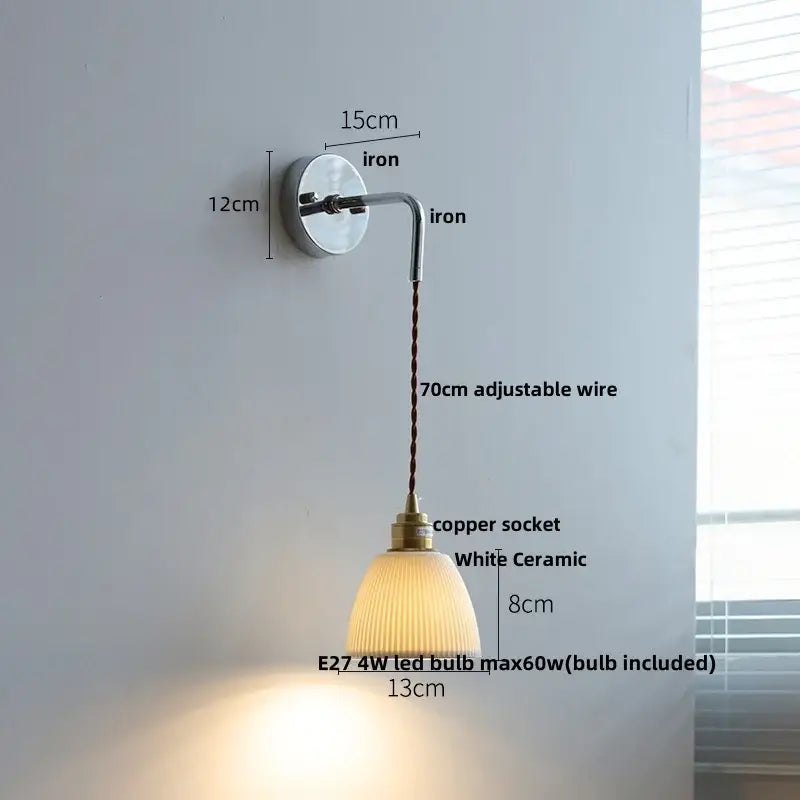 Nordic sunset wall light with polished iron bracket and copper socket holding white ceramic shade decorbites ceramic led bedroom
