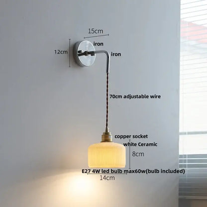 A warm white ceramic led wall light with ribbed texture and brass copper socket decorbites ceramic led for bedroom use