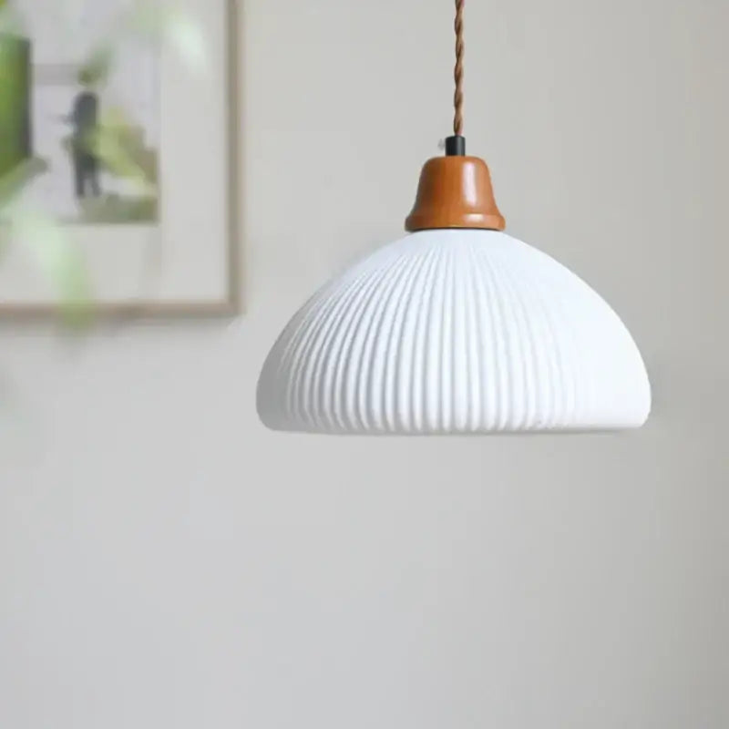 White ribbed ceramic pendant light with warm brown wood led top and twisted copper cord for dining room decorbites brown wood