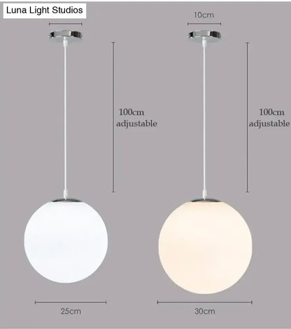 Modern decorbites™ pendant lights featuring nordic white glass ball with frosted globe and chrome ceiling mount