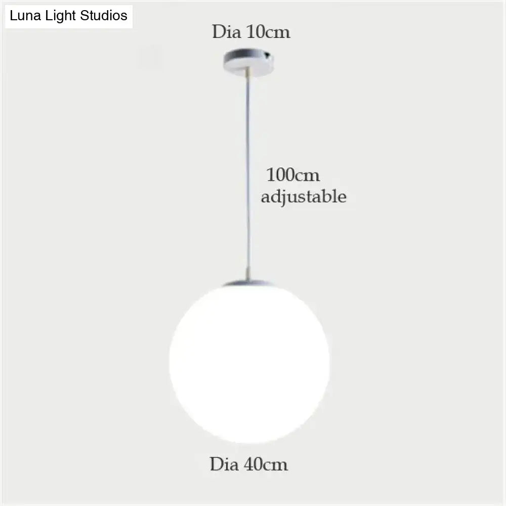DecorBites nordic white glass ball pendant light with frosted globe and chrome hardware for modern living rooms