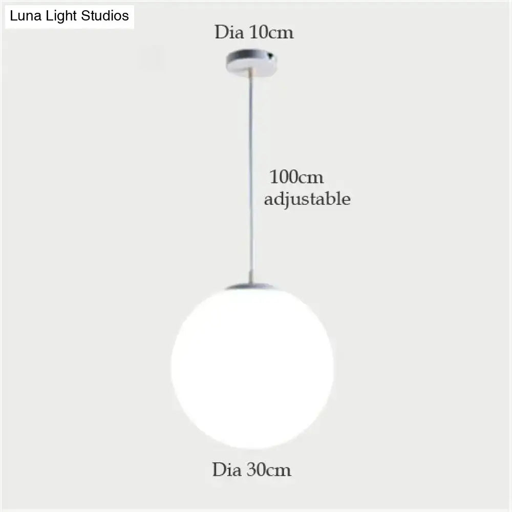 Decorbites™ nordic white glass ball pendant lights featuring a sleek frosted glass ball and chrome hardware for modern spaces