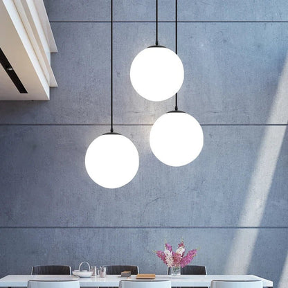 Nordic White Glass Globe Pendant Light With Iron Finish - Decorbites