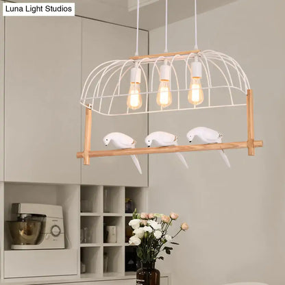 Decorbites™ nordic style island pendant with elongated white iron cage and wooden frame featuring three white parrot figurines on shelf fixture width and height suitable for islands