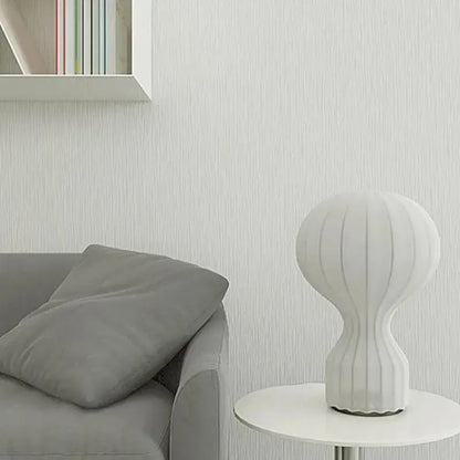 Nordic white ribbed ceramic table lamp with sleek modern design ideal for bedroom decorbites gatto silk lighting