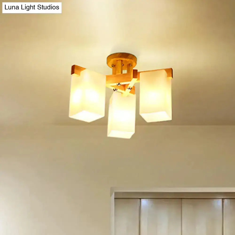 Nordic wood ceiling lamp with warm-toned cuboid cream glass shades for living room lighting