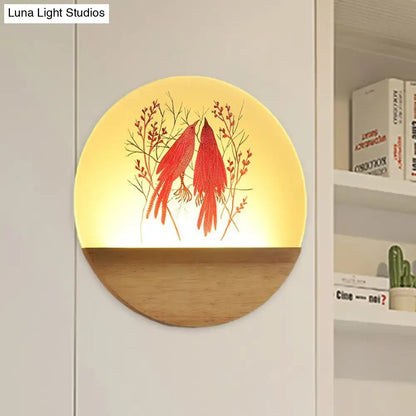 Nordic wood bird acrylic wall lamp with warm yellow glow red bird design on translucent surface and natural wood base fixture