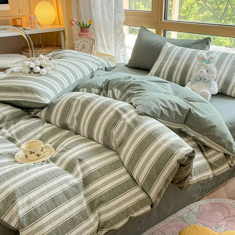 Olive and cream cotton striped bedding set featuring green and white striped linen cotton striped bedding for bedroom decorbites