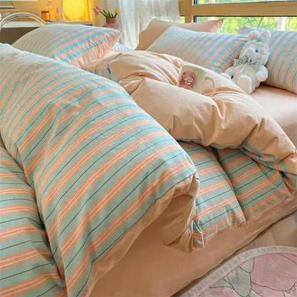 Pastel blue and peach striped cotton striped bedding set from olive and cream by decorbites for bedroom use
