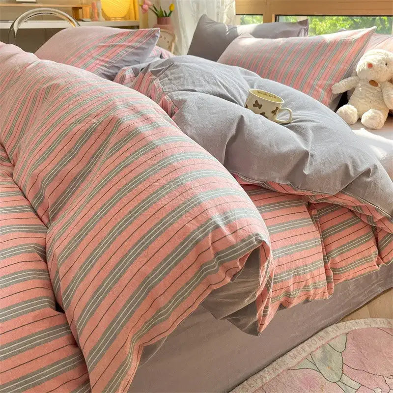 Pink and gray striped cotton striped bedding set with soft textured fabric finish from olive and cream decorbites collection