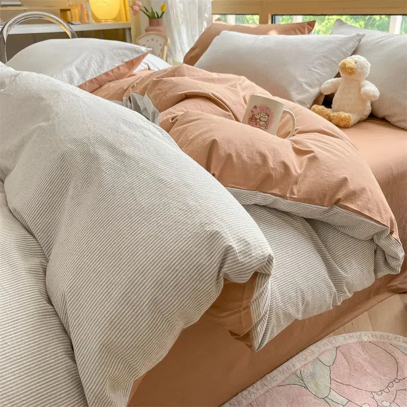 Soft peach and cream cotton striped bedding set with cozy textured fabric finish from Olive & cream decorbites cotton striped collection