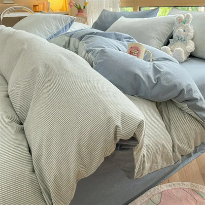 Soft gray and white cotton striped bedding set with a cozy textured fabric finish from olive and cream decorbites cotton striped collection