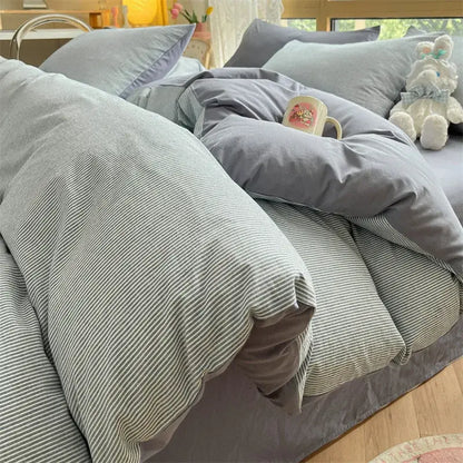 Soft gray and white striped cotton striped bedding set from Olive cream with a cozy textured fabric finish