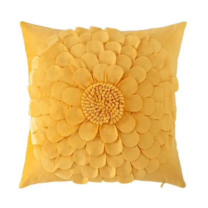 A vibrant yellow velvet cushion cover with a handmade flower design for living room decor by Decorbites handmade flower