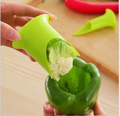 Bright green silicone corer seed remover in use from orange 2pcs vegetable cutter corer kitchen gadget set