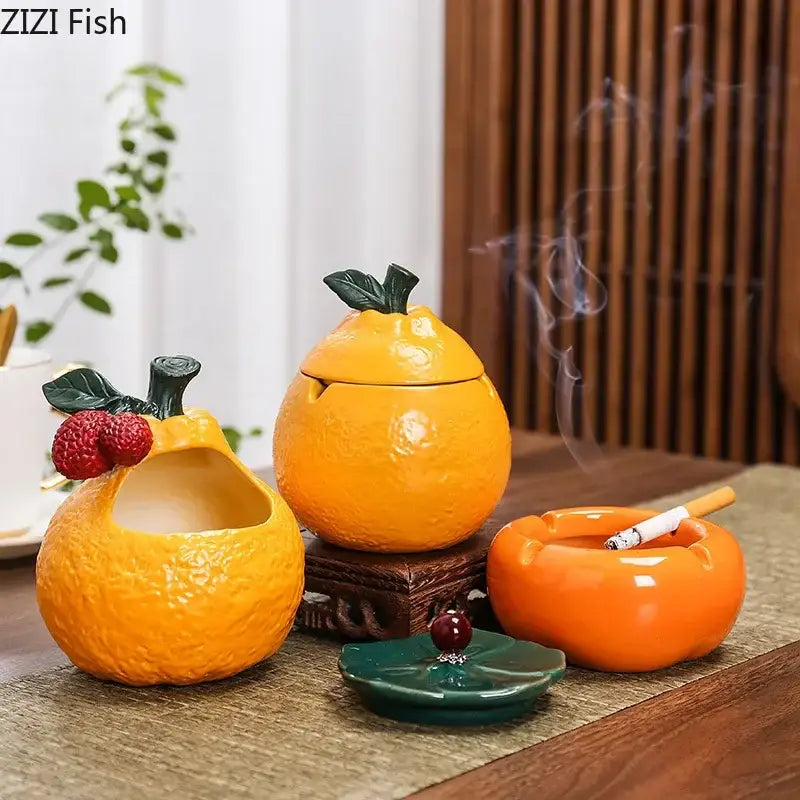 Orange ceramic fruit ashtray with green leaf accents and smoking cigarette by decorbites ceramic ashtray for living room decor