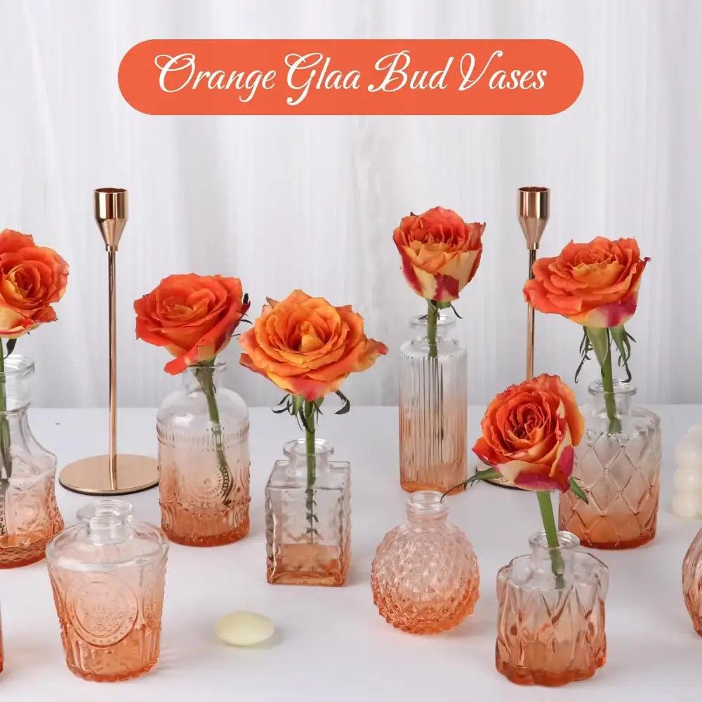 Orange glass bud vases with textured faceted designs and gradient finish for wedding centerpieces