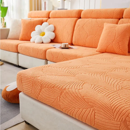 Orange and white leaf jacquard stretch sofa cover featuring a protective leaf pattern for living room sofas