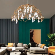 Gold-toned copper crystal ceiling chandelier with intricate wireframe and clear teardrop pendants for decorbites copper crystal decor