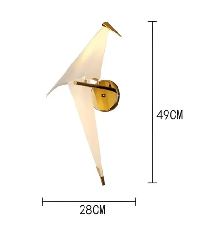 Gold-toned origami crane bird design led wall sconce with translucent white wings ideal for dining room decorbites bird design